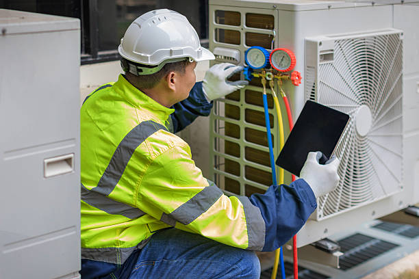 Professional Heat Pump Repair technician working in Geneva, IN